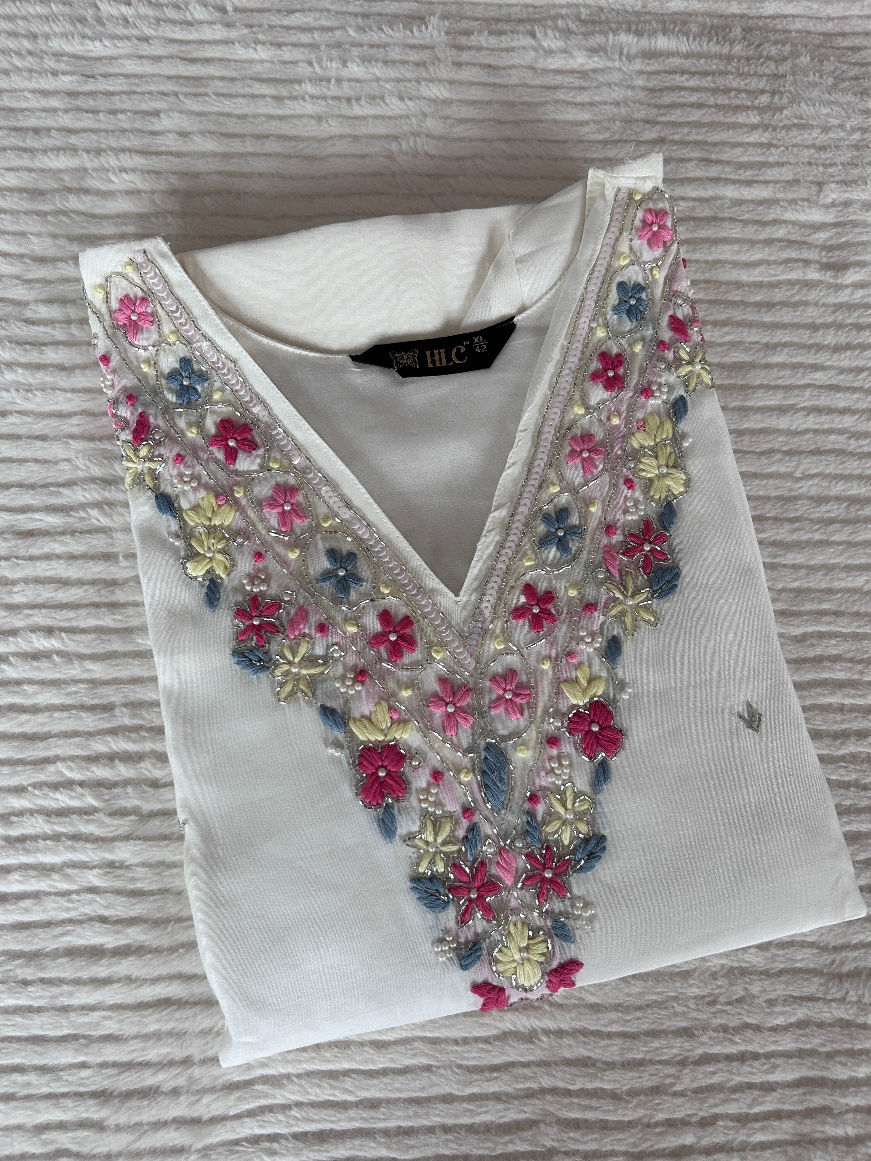 Cream colour v neck  kurta with trousers and printed organza shawl